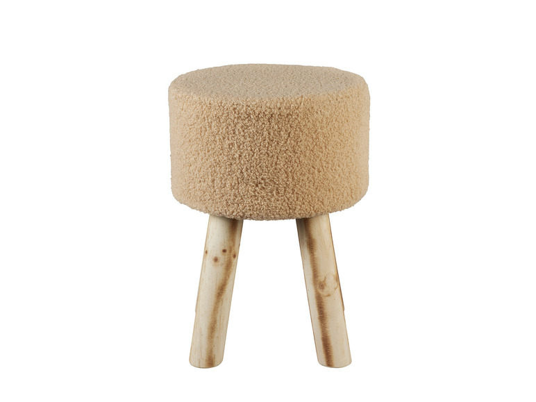 Ein beiger Plüschhocker mit Holzbeinen.