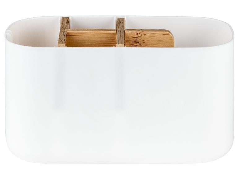 Ein weißer Organizer mit Bambusfächern.