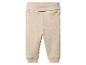 Beige Babyhose mit geripptem Bund und Bündchen.
