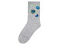 Graue Socken mit Planetenmuster.