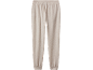 Beige Jogginghose mit elastischem Bund und Bündchen an den Knöcheln.