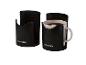 Zwei schwarze PARKSIDE Tassenhalter, einer mit einer Kaffeetasse