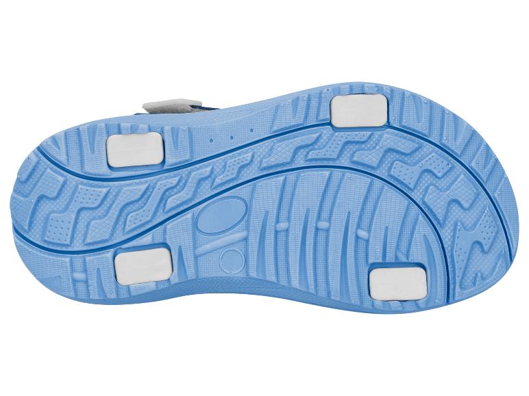 Blaue Sandalensohle mit Profil und weißen Einsätzen.