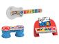 Baby Einstein Musikinstrumente: Gitarre, Trommeln und Klavier mit Tiermotiven.