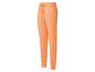 Orangefarbene Jogginghose mit 'Basic'-Logo.