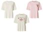 Drei Damen-T-Shirts: weiß, rosa mit „Beach Resort“ und creme mit „Hawaii Aloha“.