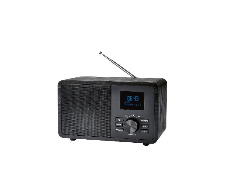 Schwarzes Retro-Radio mit LCD-Display.