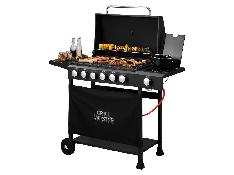 Schwarzer Grill Meister Gasgrill mit Grillgut und Zubehör.