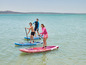 Drei Personen auf Mistral Stand Up Paddle Boards.