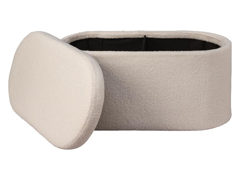 Weicher ovaler Hocker mit abnehmbarem Deckel.