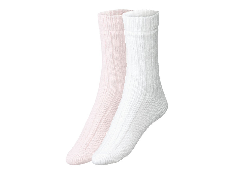 Zwei Paar Socken, weiß und rosa.