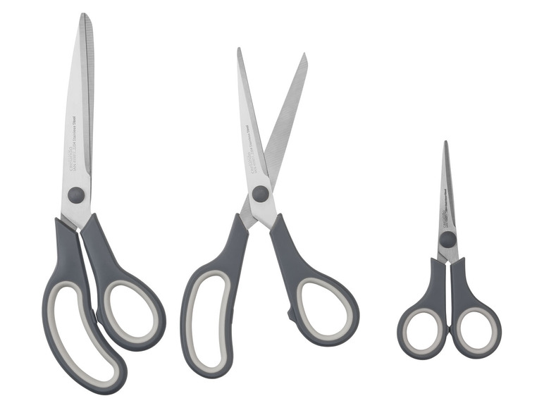 Drei Paar Crelando-Scheren mit grauen Griffen.