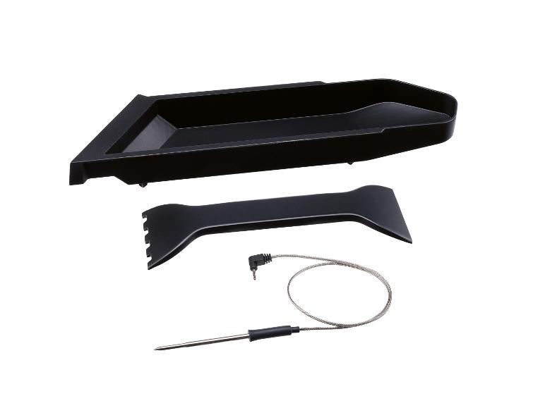 Schwarze Grillschale, Spatel und Fleischthermometer