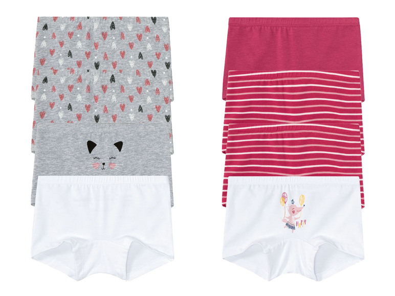 Zwei Sätze Mädchenunterwäsche, einer mit Herz- und Katzenmotiv, der andere gestreift mit einer Maus