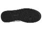 Schwarze Sohle eines Sportschuhs mit Profil und rechteckigem Logo.