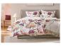 LIVARNO Mikrofaser-Satin-Wendebettwäsche mit Blumenmuster in einem Schlafzimmer.