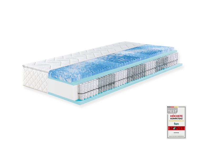 Aufgeschnittene Matratze mit Federn und Schaumschichten, zeigt höchste Kompetenz.