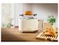 Weißer 1995 Toaster mit Brot auf Holzbrett.