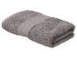 Gefaltetes graues Handtuch mit strukturiertem Waffelband