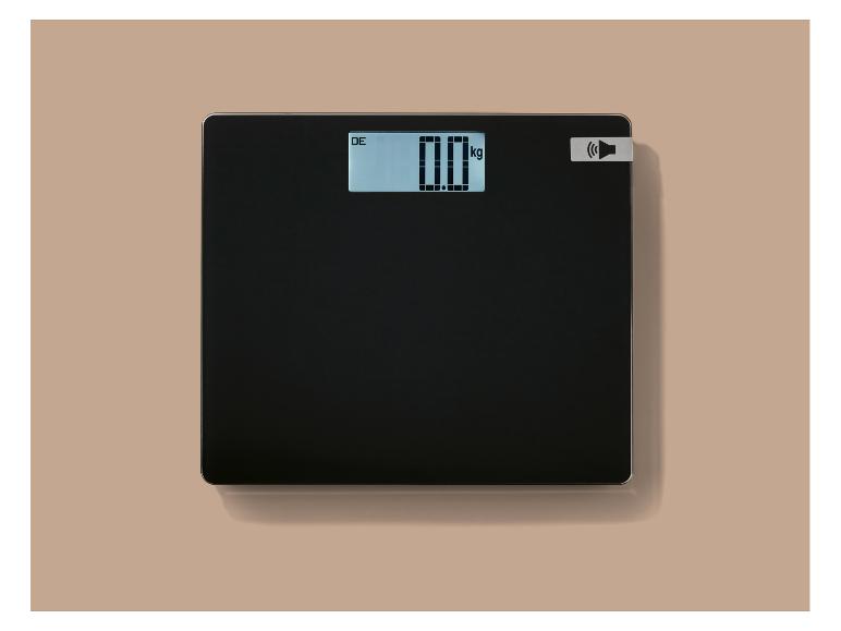 Schwarze Badezimmerwaage mit Digitalanzeige, die „0.0 kg“ anzeigt.