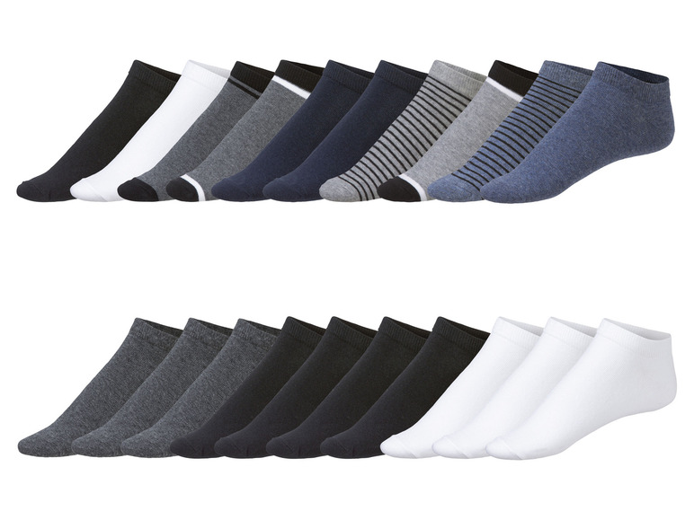 Eine Auswahl an weißen, schwarzen und grauen Socken.