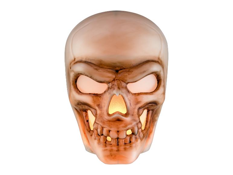Leuchtende Halloween-Totenkopf-Dekoration mit glühenden Augen und Nase.