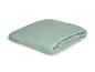 Gefaltetes mintgrünes Spannbettlaken