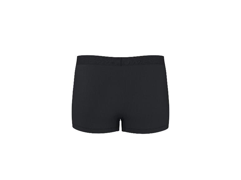 Schwarze Boxershorts mit elastischem Bund, Rückansicht.