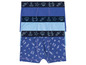 Drei blaue Boxershorts mit Meeresmotiven.
