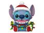 Weihnachts-Funko Pop! Stitch mit Weihnachtsmütze und Lichterkette.