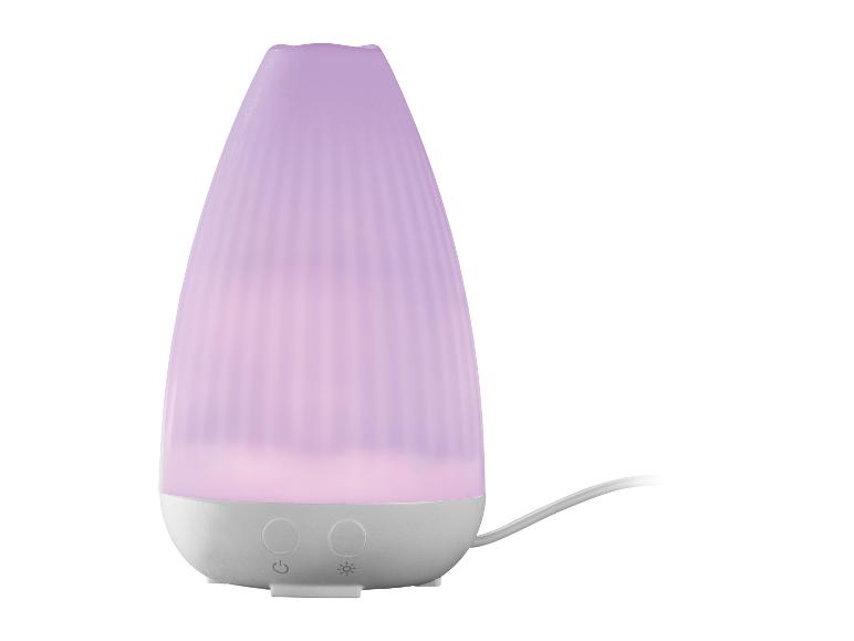 Lila Aromadiffusor mit gerippter Oberfläche und Bedientasten