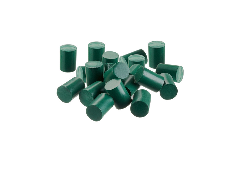 Eine Gruppe grüner, runder Kappen.