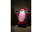 Leuchtender aufblasbarer Weihnachtsmann mit 'HO HO! CHRISTMAS' Schriftzug und Weihnachtsbaum.
