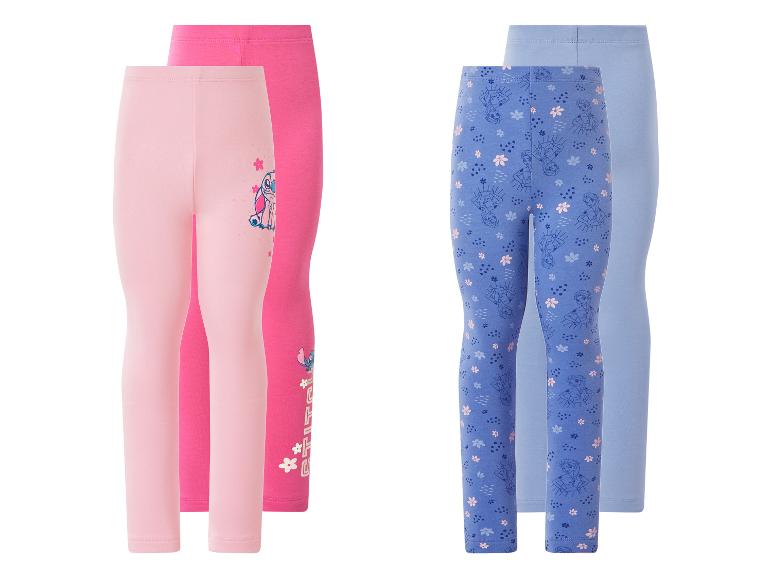 Set aus vier Kinderleggings: zwei rosa mit Alien-Motiv und zwei blaue mit Prinzessinnen-Motiv.