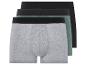 Drei Boxershorts in Grau, Grün und Schwarz.