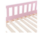 Ein rosa Holzbettgestell mit Lattenrost.