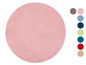Runder rosafarbener Teppich in verschiedenen Farben.