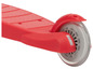 Ein roter Roller mit einem großen Rad.