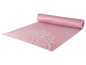 Eine rosa Yogamatte mit einem weißen Mandala-Design.
