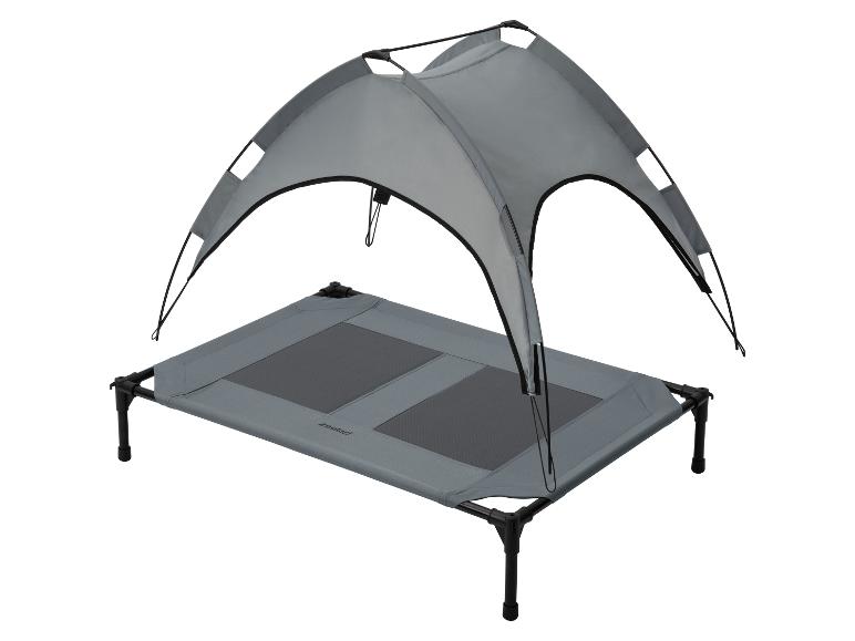 Erhöhtes Haustierbett mit grauem Sonnendach.