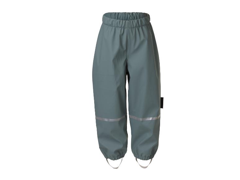 Wasserdichte Kinderhose mit reflektierenden Details und elastischen Knöchelriemen.