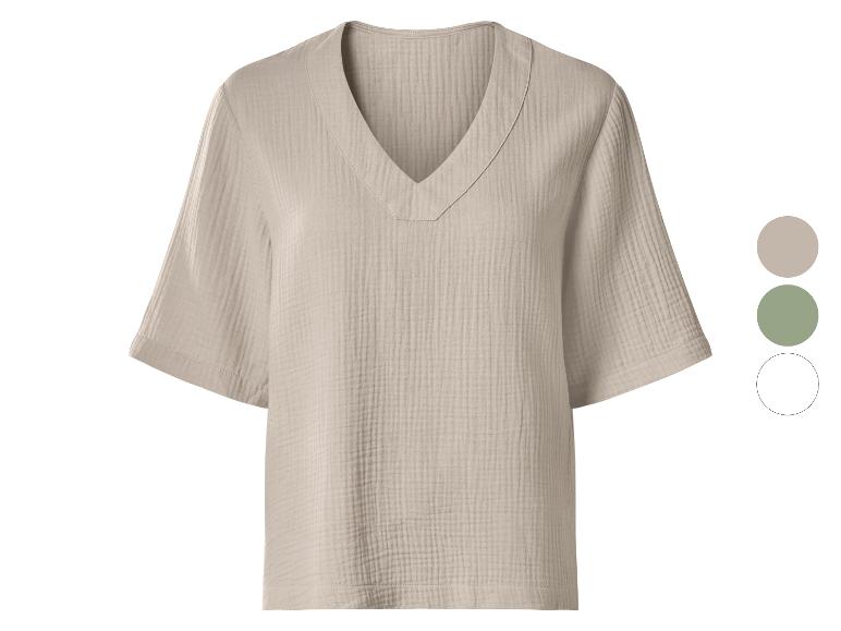 Beige Kurzarm-V-Ausschnitt-Bluse mit Crinkle-Textur, gezeigt mit Farbmustern in Beige, Grün und Weiß.