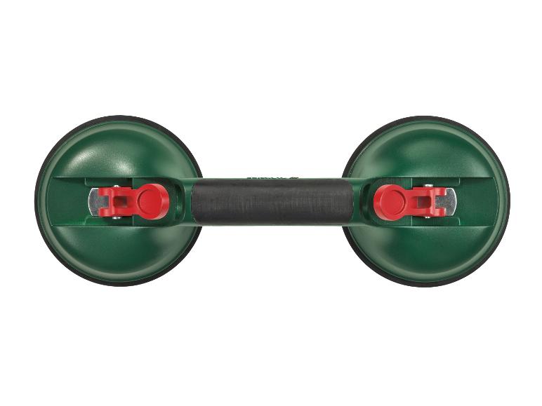Grüner Doppelsaugnapf mit schwarzem Griff und roten Hebeln