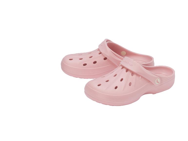 Ein Paar rosa Gummischuhe mit Belüftungslöchern.