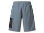 Blaue Sport Shorts mit einer schwarzen Tasche.