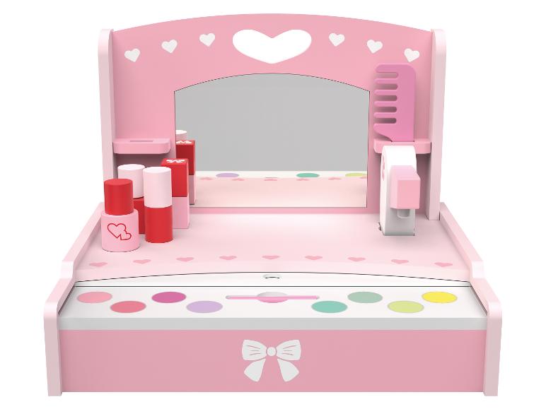 Rosa Kinderschminktisch mit Spiegel, Kosmetik und Zubehör.