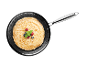 Stapel Pfannkuchen mit Beeren und Minze in einer Bratpfanne.