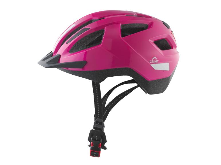 Rosa Kinderfahrradhelm mit schwarzem Visier und verstellbaren Riemen