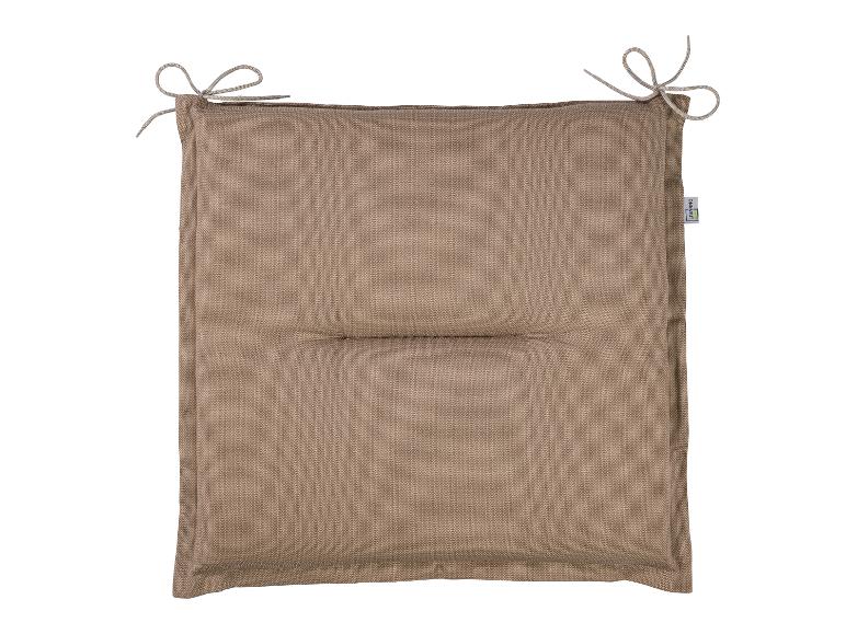 Ein beiges Sitzkissen von Livarno Living mit Schleifen.