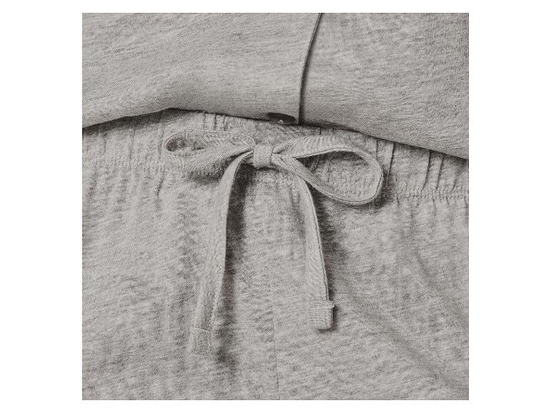 Nahaufnahme von hellgrauem Melange-Loungewear-Stoff mit gebundenem Kordelzug.